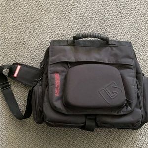 Burton utility bag with shoulder strap.